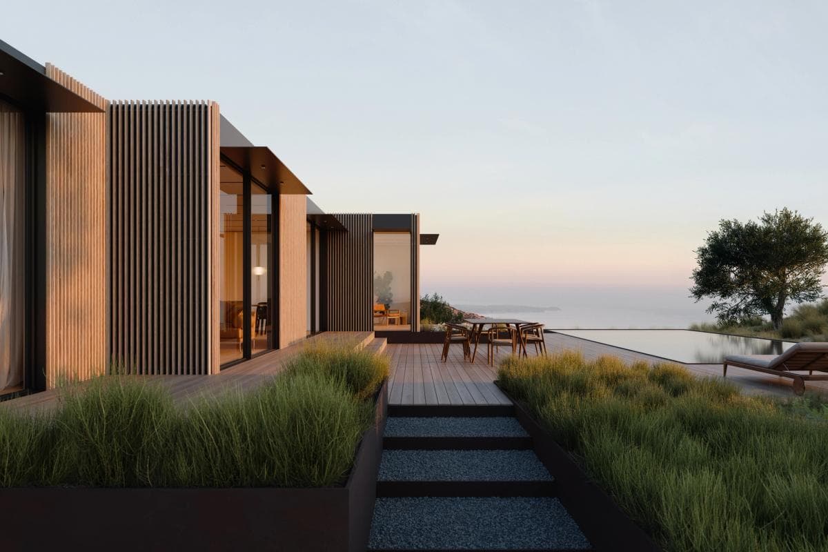 Rendering of a Cover home at dusk, its slatted wood screens opening onto a deck above the ocean