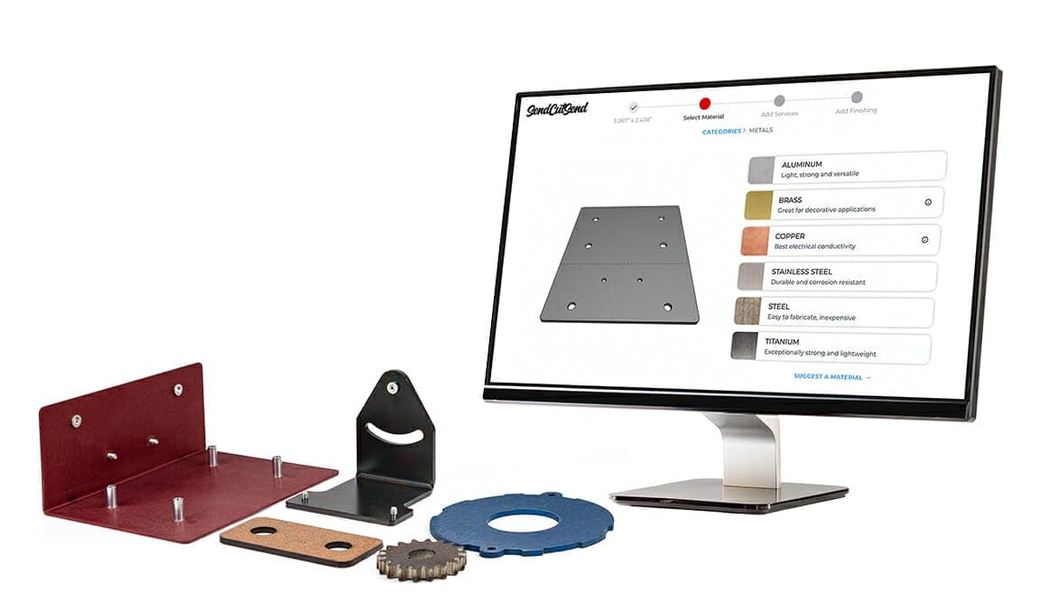 Cut and bent metal brackets, a gear and a plastic disc arranged in front of a monitor showing SendCutSend's material picker